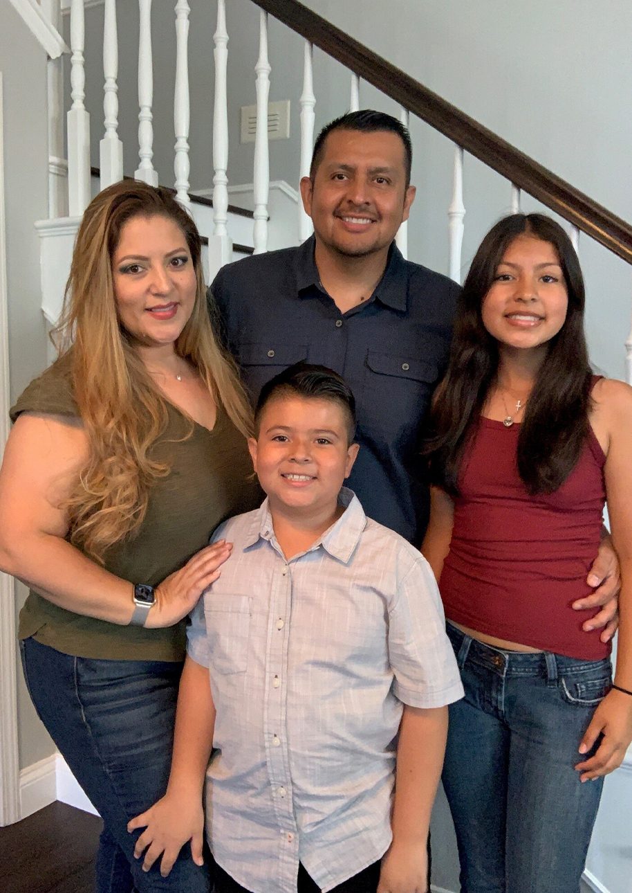 Chasity Valenzuela and husband, Carlos and two children, Isabbel and Anthony at home
